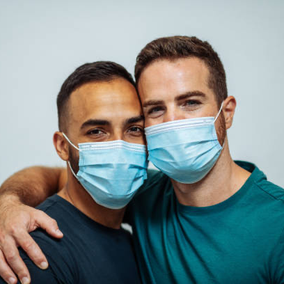two people in blue masks